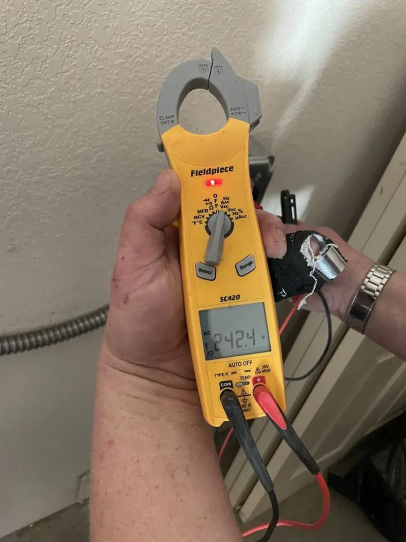 Voltage testing with clamp meter during Electrical Installation Services in East Renton Highlands
